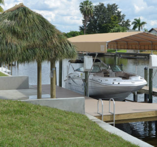 A wood dock rebuilt using composite decking, all new sub-framing, and SS hardware. The butt-nose dock is recommended on salt water lots, this allows for a smooth transition onto the dock.